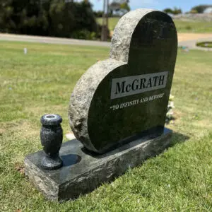 Photo of Heart Shaped Upright Headstone with cemetery and monument vases at Lone Tree Cemetery in Hayward, California