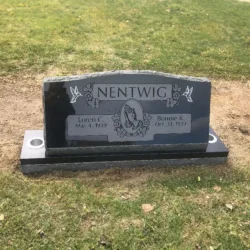 photo of upright companion headstone with praying hands at Lone Tree Cemetery in Hayward, California