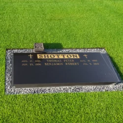 photo of a memorial grave marker at Mountain View Cemetery in Oakland, California.