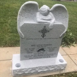 photo of upright gravestone marker with carved angel at Lone Tree Cemetery in Hayward, California