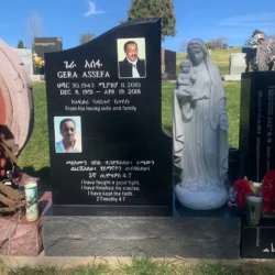 photo of upright headstone black marble grave marker with porcelain photo inlays and mother mary statue at Lone Tree Cemetery in Hayward, California